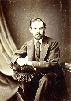 Young man in a cabinet photograph