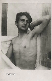 Drying Gallery: Young Man dries himself off with a towel at Taormina, Sicily, Italy. Date: 1939