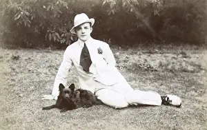 Dapper Prints: Young man in garden with small dog