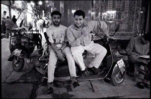 Images Dated 3rd September 2015: Young men with scooter outside Bazaar, Cairo, Egypt. Date: 1980s