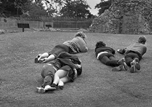 Five young people on grass - Abbey Gardens, Bury St. Edmunds
