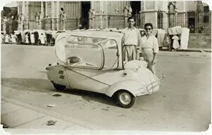 Futuristic Collection: A young (possibly) Italian couple standing proudly next to their Messerschmitt KR200