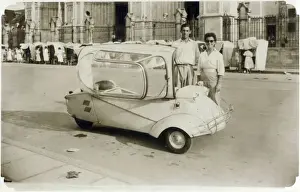 Iconic Prints: A young (possibly) Italian couple standing proudly next to their Messerschmitt KR200