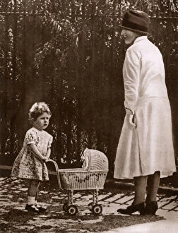London Gallery: Young Princess Elizabeth with her first toy pram