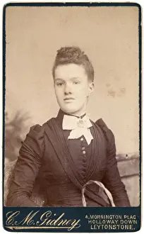 Young Victorian woman in a dark dress