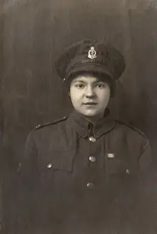 Girlfriends Prints: Young woman in British soldiers uniform, WW1