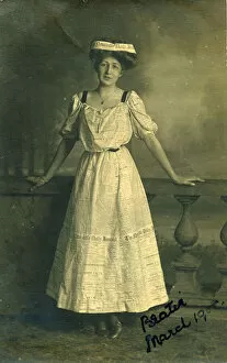 A young woman called Beatie, in a fancy dress costume as the Newcastle Daily Journal