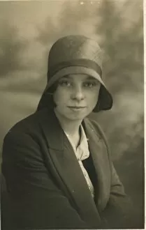 Lily Gallery: A young woman, called Lily Hughes, photographed in a cloche hat. Date: c.1928