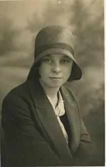 A young woman, called Lily Hughes, photographed in a cloche hat. Date: c.1928 A young woman, called Lily Hughes, photographed in a cloche hat. Date: c.1928
