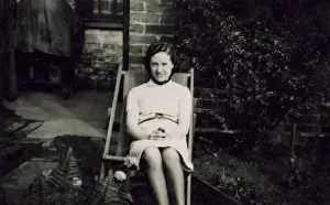 Deck Chair Prints: Young woman in deckchair