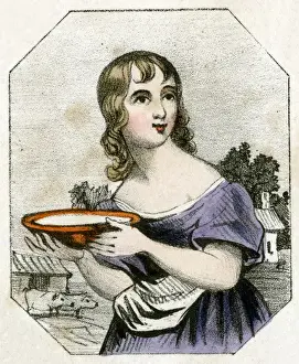 Young woman with dish of milk
