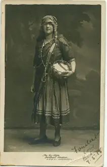 Tambourine Prints: A young woman in fancy dress, in a type of Romany gipsy costume that was very popular in