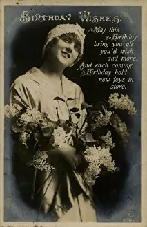 Images Dated 4th January 2012: Young woman with flowers on a birthday postcard