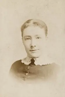 Buttoned Prints: Young woman in head and shoulders photograph