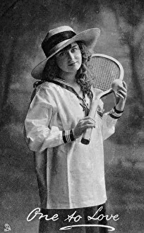 Images Dated 29th June 2017: Young woman holding a tennis racket