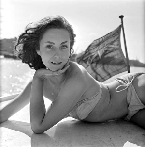 Images Dated 5th February 2016: Young woman modelling on a boat