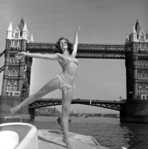 Images Dated 5th February 2016: Young woman modelling on a boat