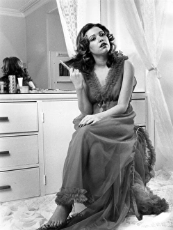 Nightie Gallery: Young woman in nylon nightie