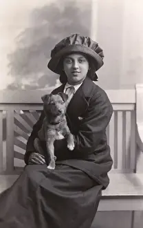 Young woman with a puppy