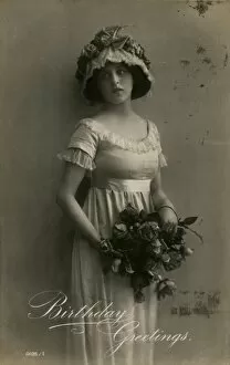 Images Dated 4th January 2012: Young woman with roses on a birthday postcard