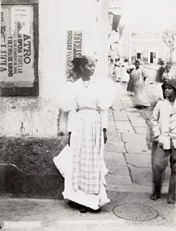 Young woman on a street corner, Puerto Rico