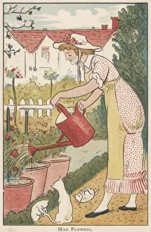 Young woman watering her garden