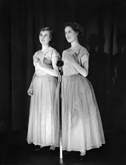 Diaphanous Prints: Two young women performing on stage