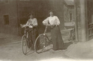 Galloway Collection: Two young women pose proudly with their bicycles at Moffat in Dumfriesshire