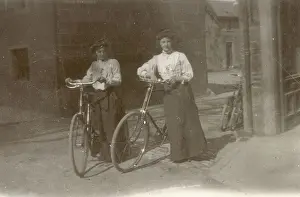 Galloway Prints: Two young women pose proudly with their bicycles at Moffat in Dumfriesshire