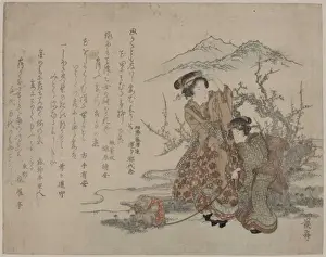Young women walking a monkey under a plum tree