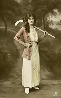 Cardigan Gallery: Youthful British Beauty holding her hockey stick