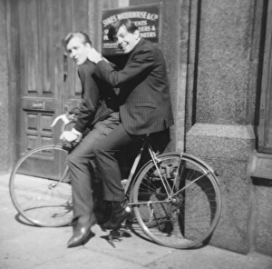 Images Dated 27th March 2012: Youths on bike, Liverpool