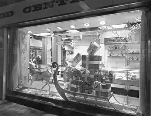 Sleigh Prints: Yuletide festive window display with reindeer and sleigh
