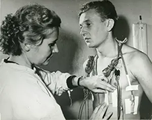 Z. A. Arapova, left, a senior laboratory assistant in a ?