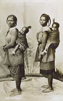 Two Zulu Mothers carrying their children